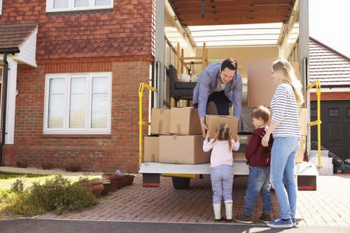 Commercial and residential moving service with a removals van in East London