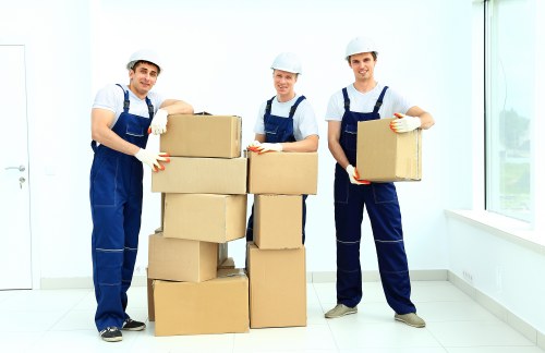Packed boxes and staircase access during a local house removal