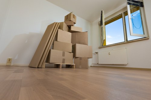 Packed boxes and furniture ready for local removals