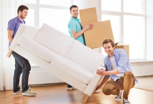 Removal team handling a house move in Plaistow