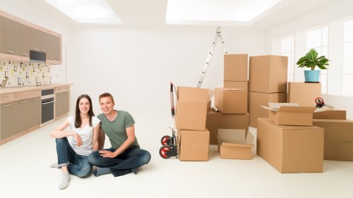 Packed boxes and furniture ready for man and van removal in Plaistow