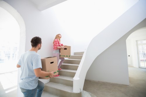Loading furniture into a local removal van in East London