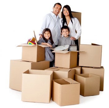 Packed boxes and furniture ready for transport by movers in Plaistow